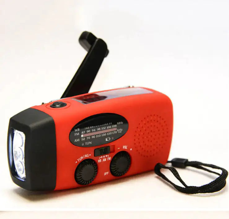 Solar hand crank USB charging radio flashlight Towed To Adventure