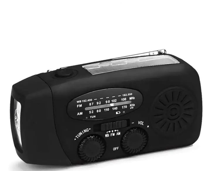 Solar hand crank USB charging radio flashlight Towed To Adventure