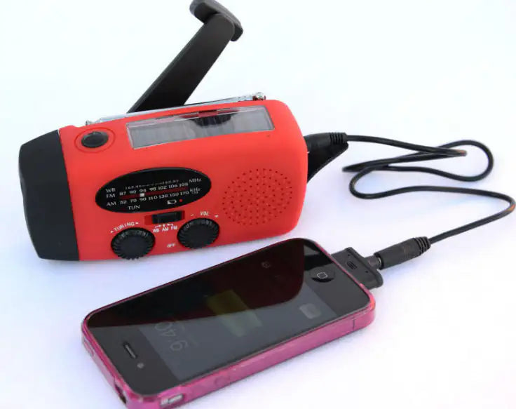 Solar hand crank USB charging radio flashlight Towed To Adventure