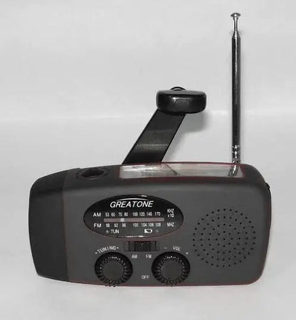 Solar hand crank USB charging radio flashlight Towed To Adventure