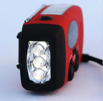 Solar hand crank USB charging radio flashlight Towed To Adventure